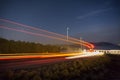 Truck light trails in tunnel. Art image . Long exposure photo taken on a road next to seaside