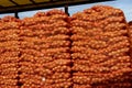 Truck Loaded With Palletized Onion Bags Wrapped in Netting, Ready for Transportation Royalty Free Stock Photo