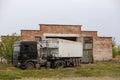 A truck loads a seed from a hangar in a village. Village Food Exports