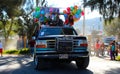 Truck with many toys and ballons