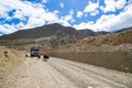 A truck in the middle of an offroad in a desert in Ghiling Village of Upper Mustang, Nepal