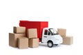 Truck model and carton boxes on background. Courier service