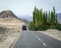 A truck on mountain road in Leh, India