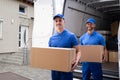 Truck Movers Loading Van Carrying Boxes Royalty Free Stock Photo