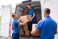 Truck Movers Loading Van Carrying Boxes Royalty Free Stock Photo