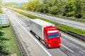 Truck moves on the road at speed, delivery of goods. Royalty Free Stock Photo