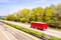 Truck moves on the road at speed, Royalty Free Stock Photo