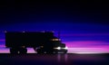 Truck moving on highway at night. Classic big rig semi truck headlights dry van in dark on night road on starry sky background Royalty Free Stock Photo