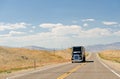 Truck on Nevada desert highway Royalty Free Stock Photo