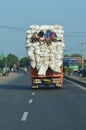 Truck overloaded with rice sacks Royalty Free Stock Photo