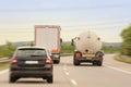 A truck in overtaking on a two-lane highway as a road obstacle