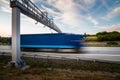 Truck passing through a toll gate on a highway