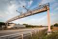 Truck passing through a toll gate on a highway