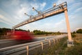 Truck passing through a toll gate on a highway Royalty Free Stock Photo