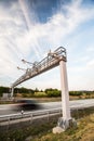 Truck passing through a toll gate on a highway