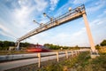 Truck passing through a toll gate on a highway