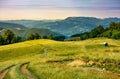 Truck path down the grassy hill Royalty Free Stock Photo