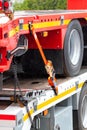 Cargo platform of the car, securing the load and holding the load with a strap. Vertical image Royalty Free Stock Photo