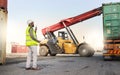 Truck, radio and forklift in logistics of container at port with man for shipping. Worker, talk and control for safety Royalty Free Stock Photo