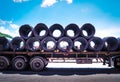 Truck receives steel wire rod from warehouse container unstuffing area. Royalty Free Stock Photo