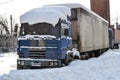 Truck. Refractor. Littered with snow. Snow drifts, unpeeled roads. Impassable snow drifts