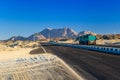 Truck on a road in arabian desert not far from Hurghada city, Egypt