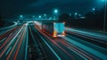 Truck on road at night. Motion blur with light trails Royalty Free Stock Photo