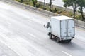 truck running on the road, small truck on the road Royalty Free Stock Photo