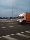 the truck runs on the expressway very fast