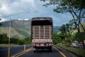 Truck on a rural road in a mountainous area of Colombia. Royalty Free Stock Photo