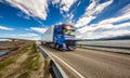 Truck rushes down the highway in the background Atlantic Ocean R Royalty Free Stock Photo