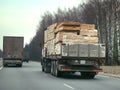 Truck with sawn timber cargo i Royalty Free Stock Photo