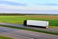 Truck with semi-trailer driving on highway Royalty Free Stock Photo