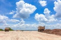 Truck at site construction under blue sky and nice cloud midday Royalty Free Stock Photo