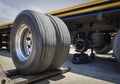 Truck Spare Wheels Tyre Waiting for to Change. Semi Truck Maintenace and Repairing Royalty Free Stock Photo