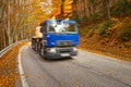 Truck speeding through forest Royalty Free Stock Photo