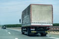 Truck on country highway under blue sky Royalty Free Stock Photo