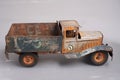 old tin cargo truck toy from the year 1950 faded profile Royalty Free Stock Photo