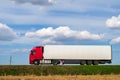 Truck trailer with container. Cargo delivery vehicle template, side view. Big commercial cargo van, freight car. Branding mockup Royalty Free Stock Photo