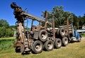 Truck for transporting huge tree logs