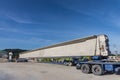 Truck transport pre-fabricated concrete beam to construct light rail transit infrastructure