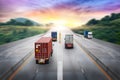 Truck transport with red container on highway road at sunset, motion blur effect, logistics import export background Royalty Free Stock Photo