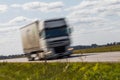 Truck transport on the road with motion blur. Blurred image back Royalty Free Stock Photo