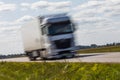 Truck transport on the road with motion blur. Blurred image back Royalty Free Stock Photo