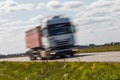 Truck transport on the road with motion blur. Blurred image back Royalty Free Stock Photo