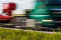 Truck transport on the road with motion blur. Blurred image back Royalty Free Stock Photo