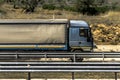 Truck traveling on the highway without logo