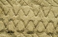 Truck tyre imprint on sand surface. Royalty Free Stock Photo