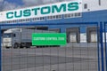 Customs control space with truck near warehouse storage of goods