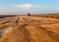 Truck unloads sand